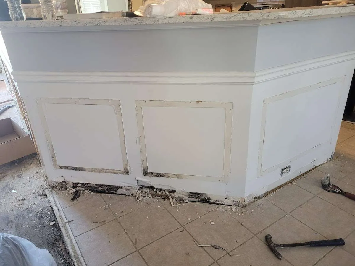 Water damage and mold on kitchen during Storm Damage Restoration in Ocean Shores